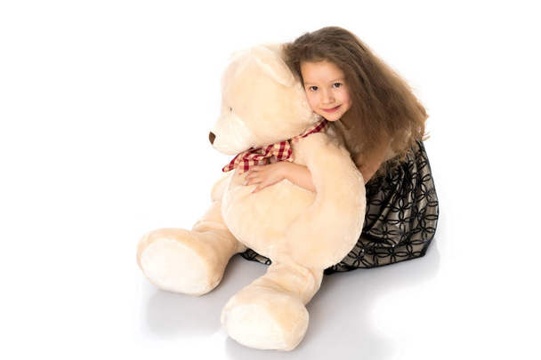 Little girl with teddy bear - Valokuva, kuva