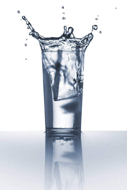 Water Splash in A Glass - Фото, изображение