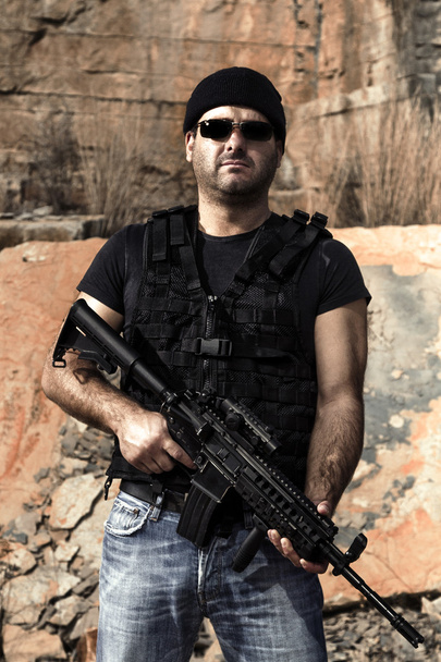 man with a machine gun - Photo, Image