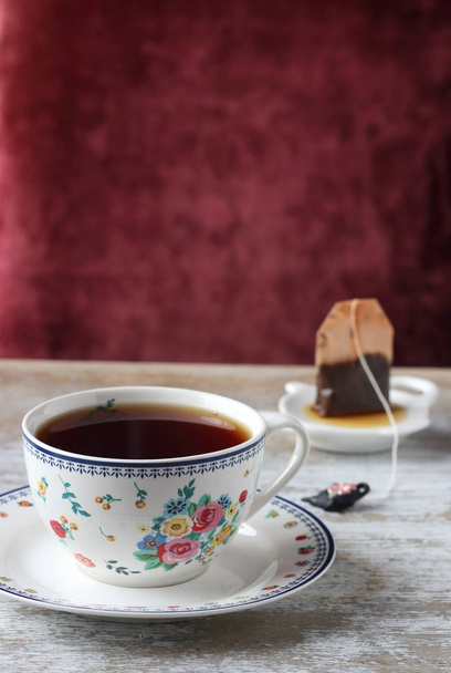 A cup of tea and tea bag - Zdjęcie, obraz