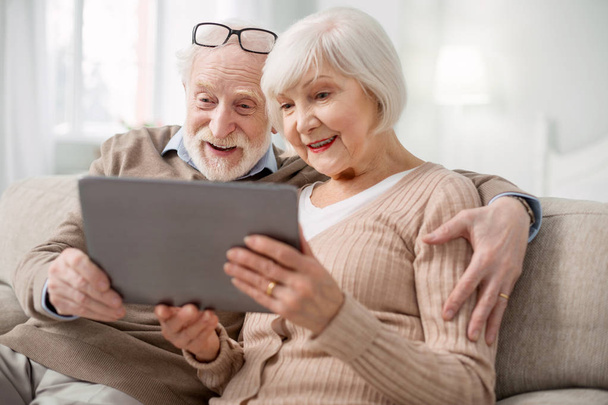 Nice senior couple using modern technology - Photo, image