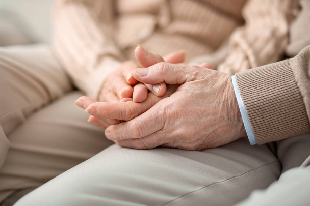 Hands of pleasant elderly couple - Foto, imagen