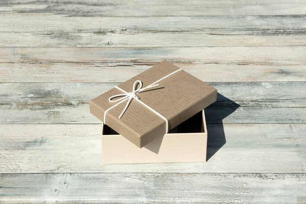 Greeting card. Opened Birthday gift box with white ribbon bow. P - Φωτογραφία, εικόνα