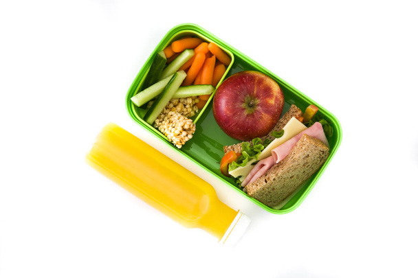 Здоровий шкільний обід: сендвіч, овочі, фрукти та сік ізольовані на білому тлі. Вид зверху
 - Фото, зображення