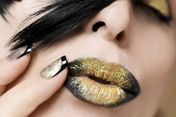 Festive fashion black gold make up and French manicure in close-up.Nail art. - Fotoğraf, Görsel