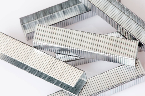 Metal staples for stapler, closeup on white background. - Photo, Image