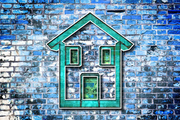 レンガ壁の背景に描かれた色の家 - 写真・画像