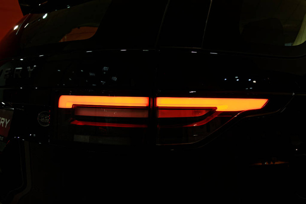 Detail op het achterlicht van een auto. - Foto, afbeelding