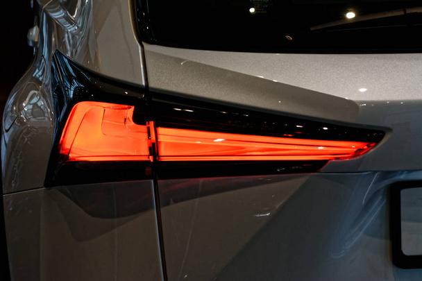 Detail on the rear light of a car. - Fotoğraf, Görsel