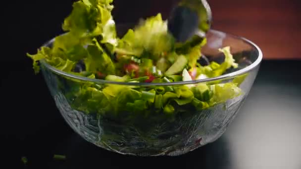 stir vegetable salad in a glass cup - Filmagem, Vídeo