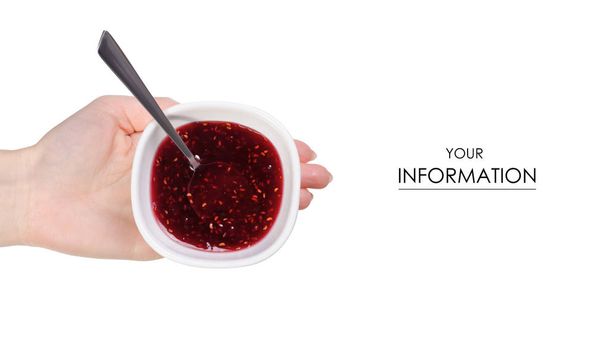 Bowl spoon of raspberry jam in hand pattern - Fotó, kép