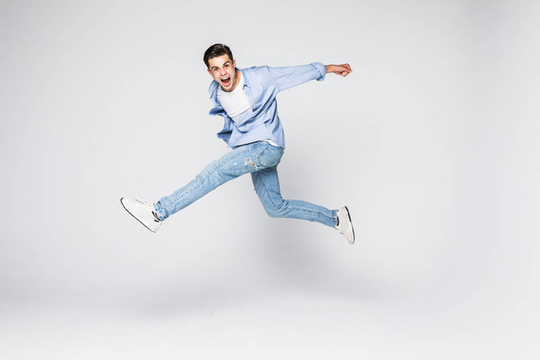 Success win winner achievement goal lifestyle leisure sexy people person cool swag people person concept. Full-length full-size portrait of attractive muscular guy jumping up isolated gray background - Фото, зображення
