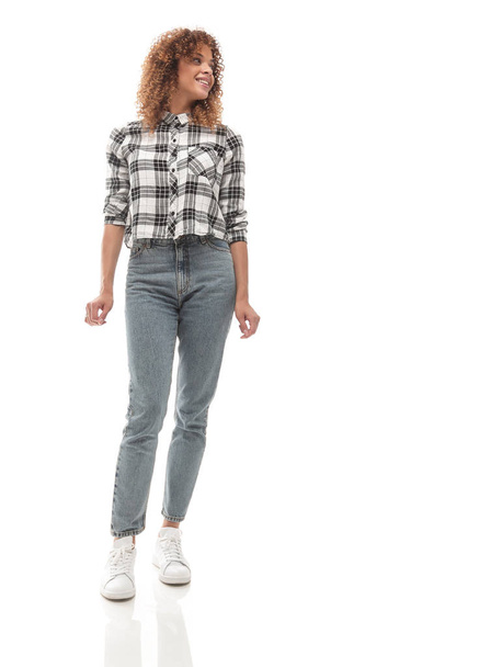 stylish young woman in plaid shirt and jeans. - Fotografie, Obrázek
