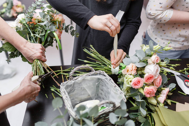 Master class on making bouquets. Spring bouquet. Learning flower arranging, making beautiful bouquets with your own hands - Photo, Image