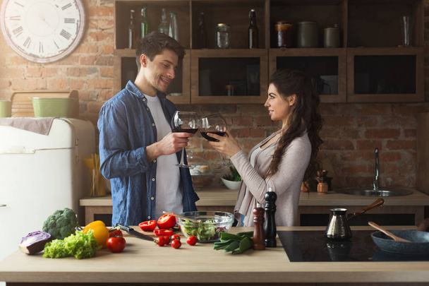 Happy couple cooking healthy food together - Fotografie, Obrázek