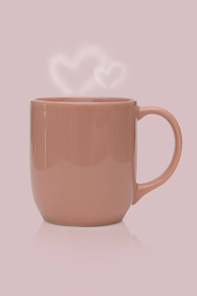 Pink ceramic mug or Coffee cup with heart smoke isolated on pink - Φωτογραφία, εικόνα