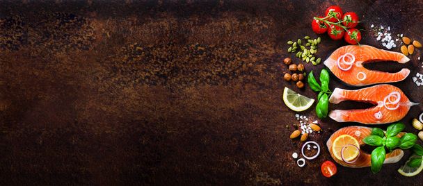 Salmon fillet, fish on wooden background with free space for your text. Top view. Healthy food, diet or cooking concept. Banner. - Foto, Imagem