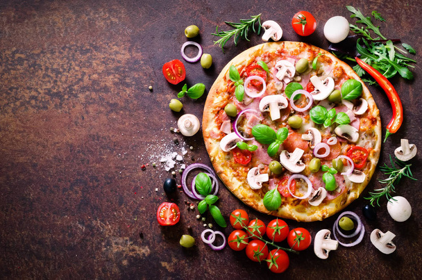 Food ingredients and spices for cooking delicious italian pizza. Mushrooms, tomatoes, cheese, onion, oil, pepper, salt, basil, olive on rustic background. Copyspace. Top view. Banner. - Fotografie, Obrázek