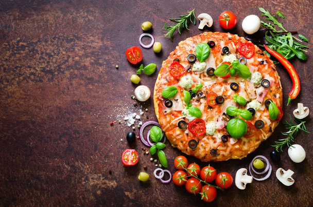 Food ingredients and spices for cooking delicious italian pizza. Mushrooms, tomatoes, cheese, onion, oil, pepper, salt, basil, olive on rustic background. Copyspace. Top view. Banner. - Foto, Imagem