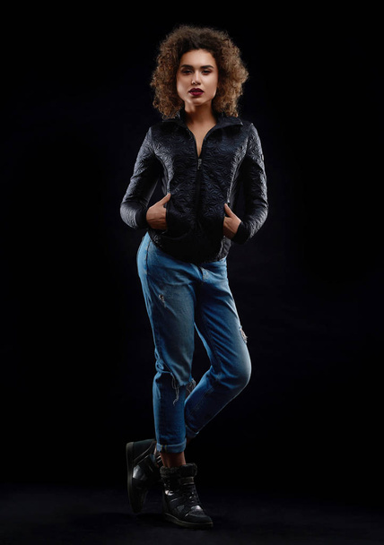 Frontview of curly girl dredded in stylish clothes. - 写真・画像
