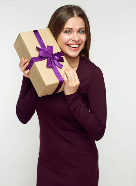 Happy woman holding gift box. - Fotó, kép