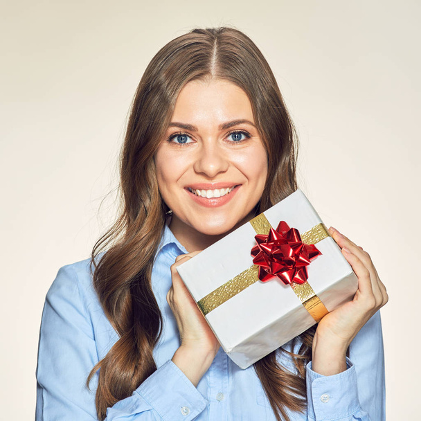 smiling business woman holding gift box - 写真・画像