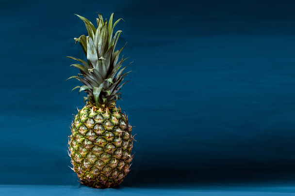 pineapple on a blue background - Photo, Image