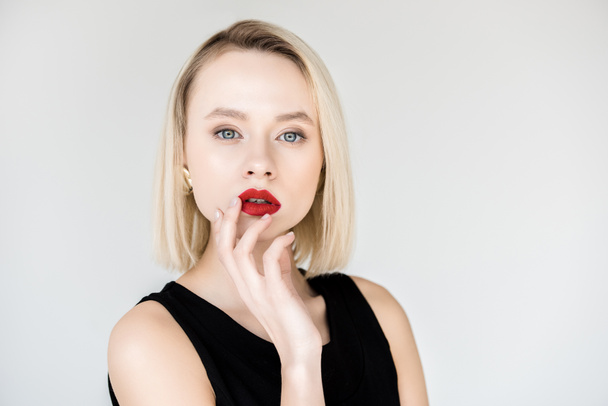 attractive stylish blonde woman with red lips looking at camera isolated on white - Fotografie, Obrázek