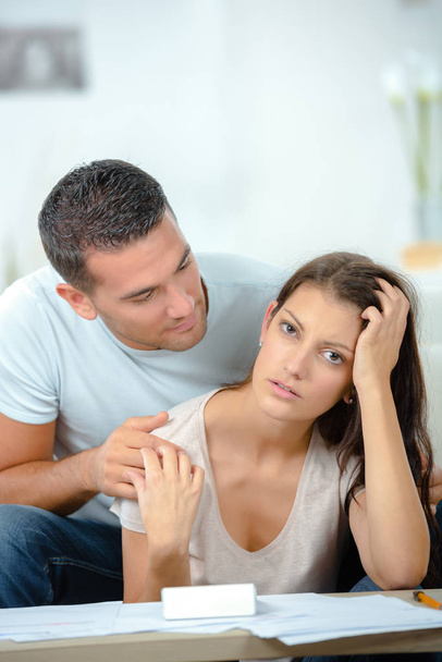 worried couple after fight sitting on sofa - Foto, immagini