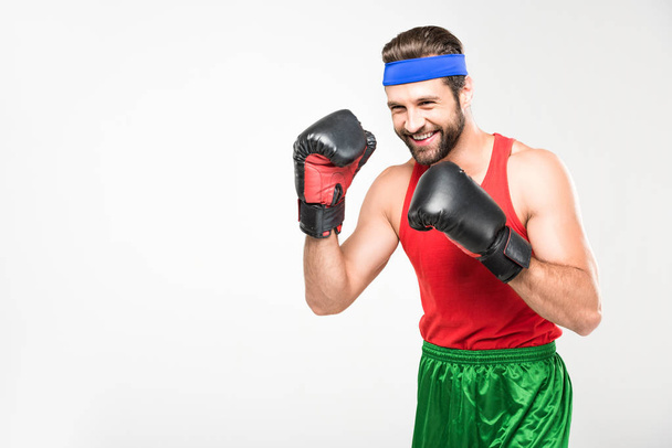 retro man training in boxing gloves, isolated on white - Фото, зображення