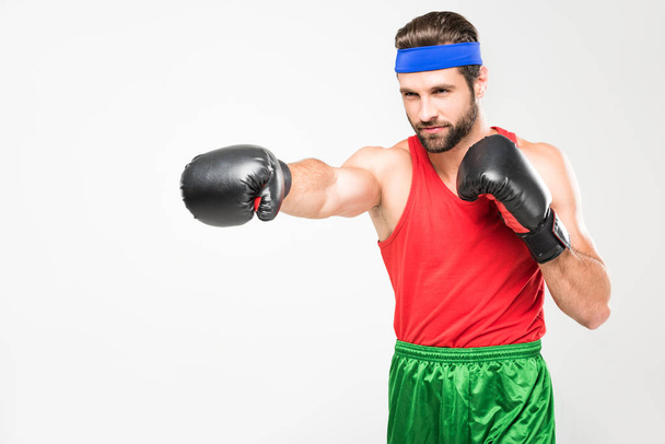 retro athletic man in boxing gloves, isolated on white - Fotó, kép