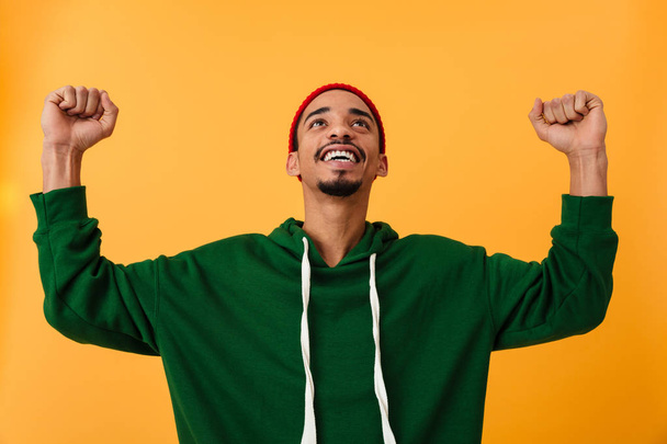 Portrait of a happy young afro american man in hat - Fotó, kép