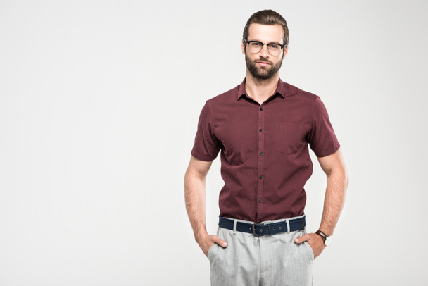 serious man posing in casual closing and eyeglasses, isolated on grey - Photo, Image