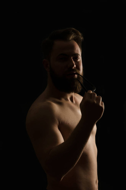 shirtless, handsome young man standing. Studio shot of light, - Photo, Image