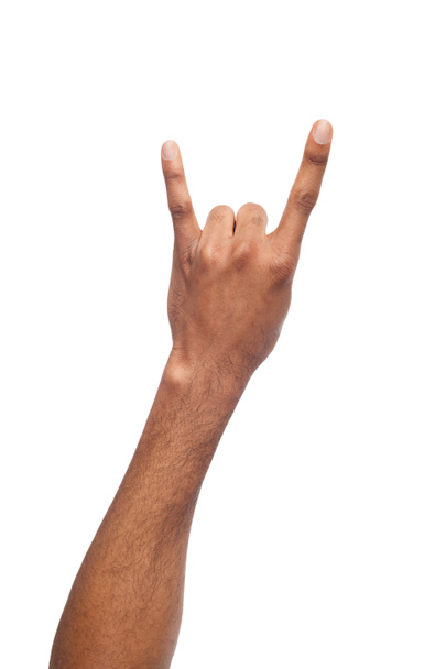 Zwarte mannenhand rocknroll gebaar geïsoleerd op wit - Foto, afbeelding