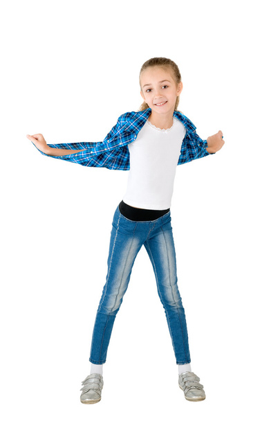 The girl in jeans and a checkered shirt - Foto, imagen