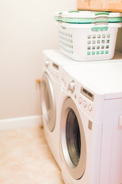 Doing laundry in laundry room - Photo, Image
