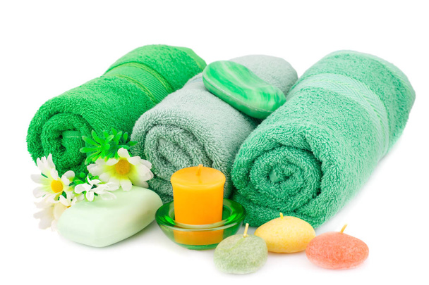 Spa set with towels, candles, soaps and flowers isolated on white background. - Photo, Image