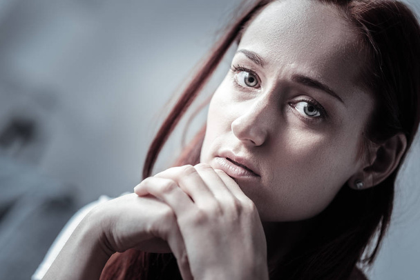 Mournful painful woman immersing in depression - Valokuva, kuva