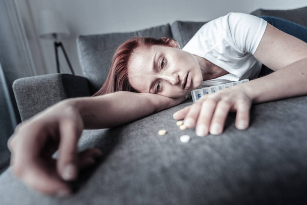 Exhausted tired woman overwhelming by depression - Photo, image
