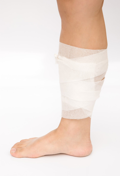 Male's leg wrapped with bandage - Φωτογραφία, εικόνα