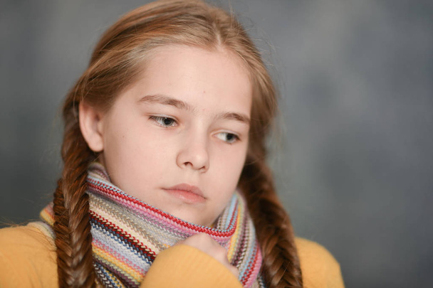 Portrait of sick  girl wearing scarf  - Photo, Image