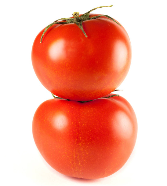 два червоні помідори на білому тлі
. - Фото, зображення