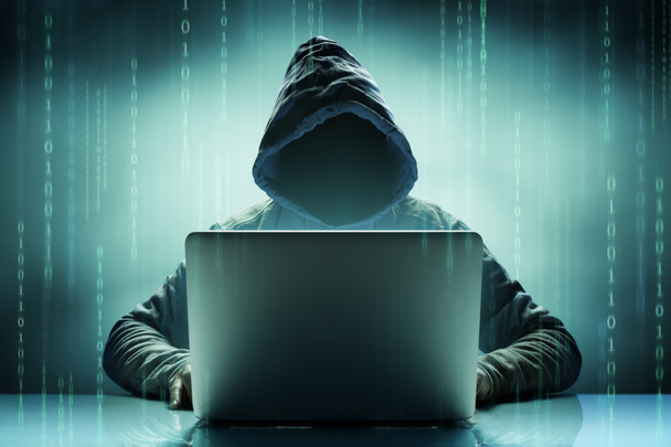 Faceless Anonymous Computer Hacker With Laptop - Φωτογραφία, εικόνα