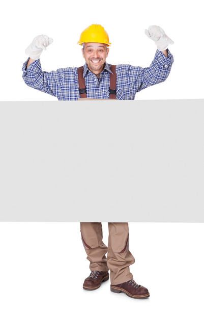 Portrait Of Happy Contractor Holding Placard - Фото, изображение