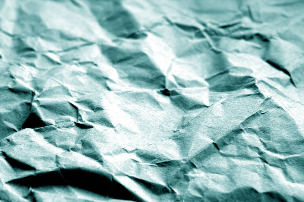 altes Papier mit Falten in Cyanfarbe. - Foto, Bild