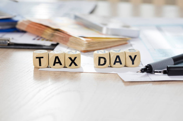 Word Tax Day composed of wooden letters. Closeup - Фото, зображення