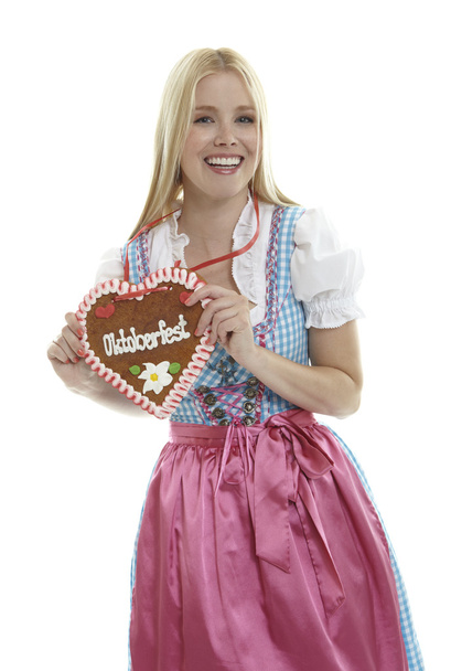 Woman with German Gingerbread heart - Photo, Image