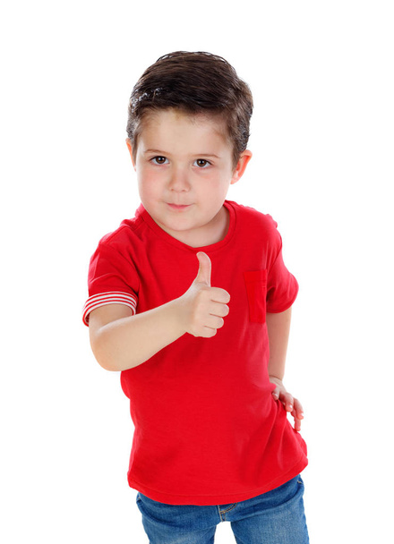 cute happy boy in red t-shirt showing thumb up isolated on white background - Foto, Imagem