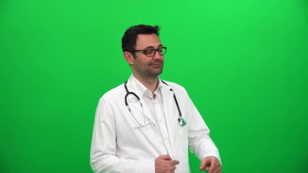 Lekarz, wskazując palcem do lewej - Materiał filmowy, wideo